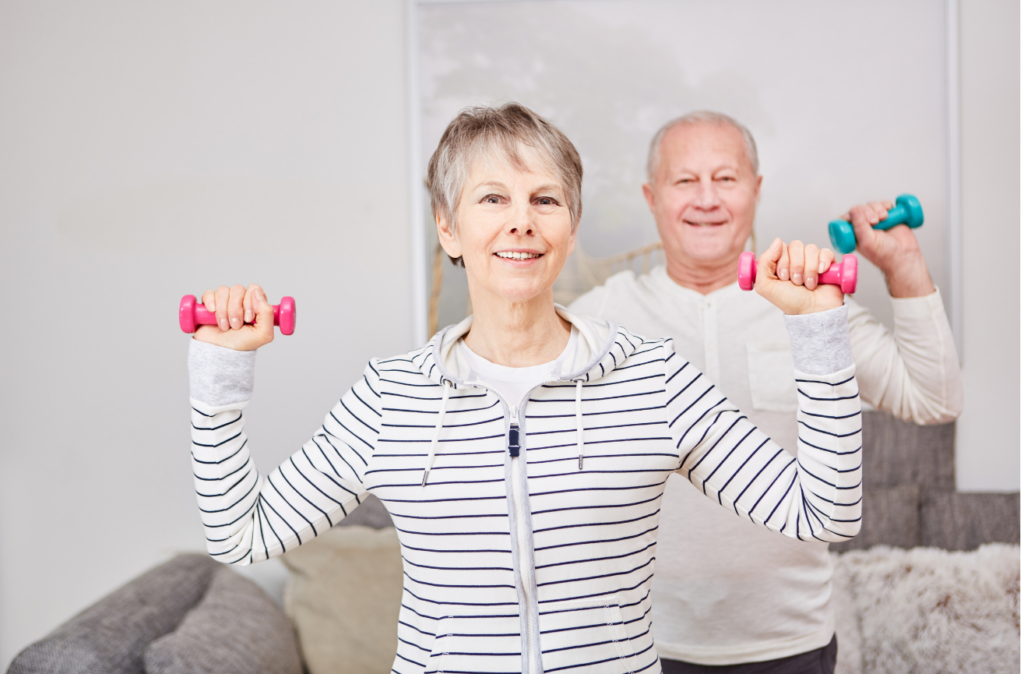 Senior couple lifting weights